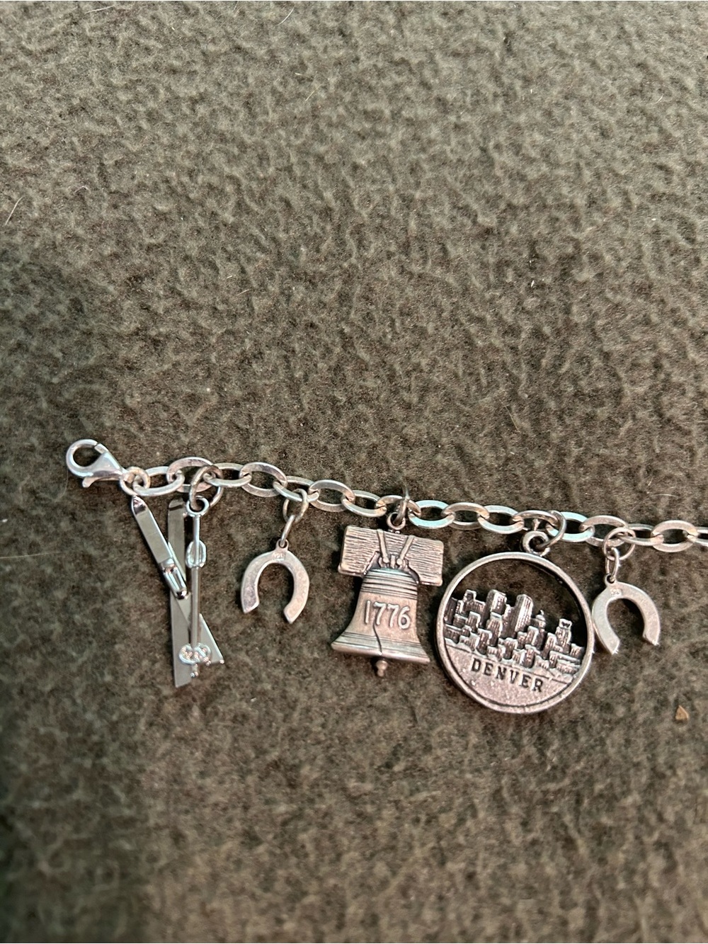 Sterling Silver Charm Bracelet with 13 Charms. - Picture 7 of 9